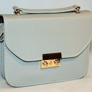 handle/leather style crossover